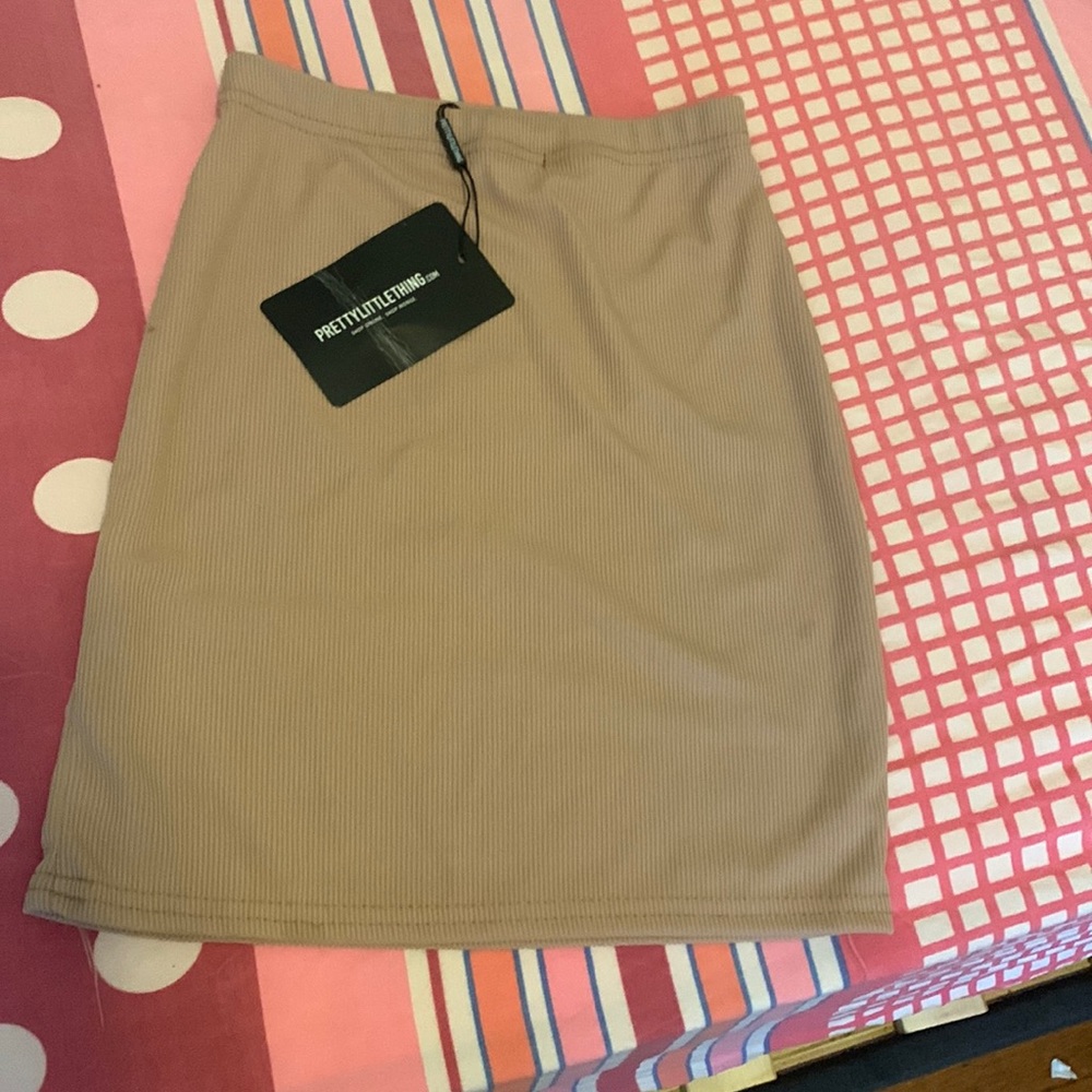 Sexy tan prettylittlething mini skirt